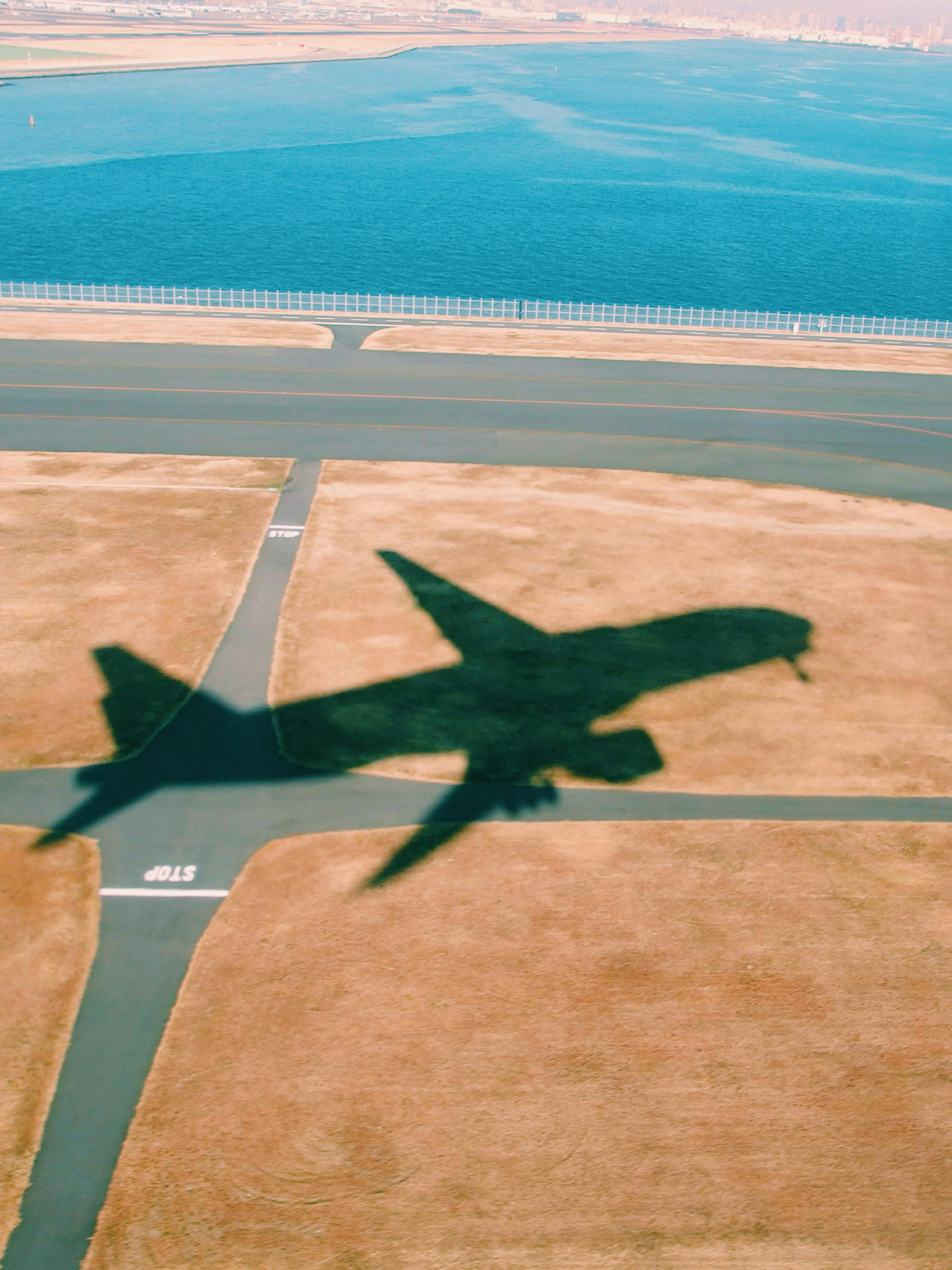 shadow of plane over desert