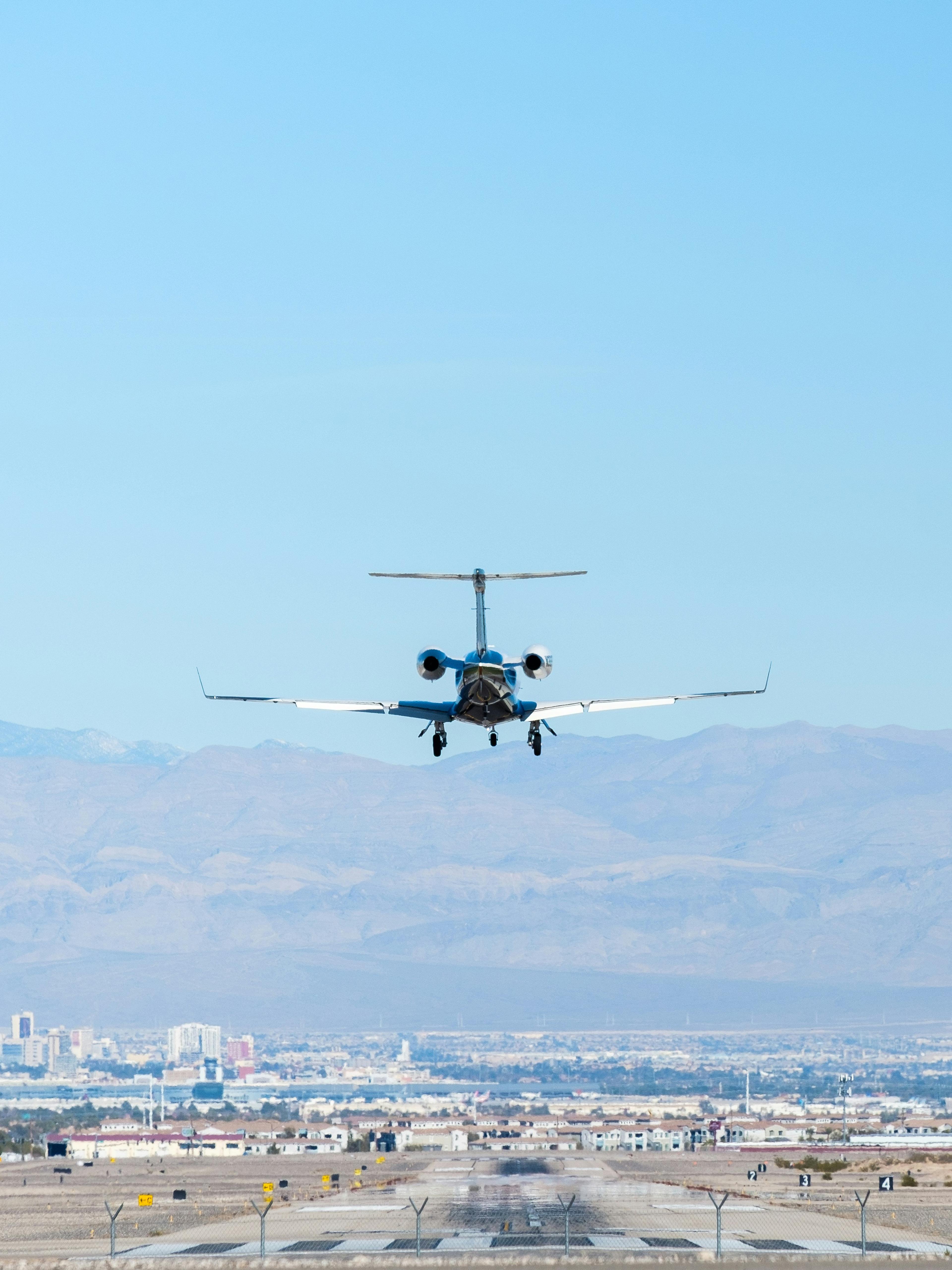 a plane taking off over a runway